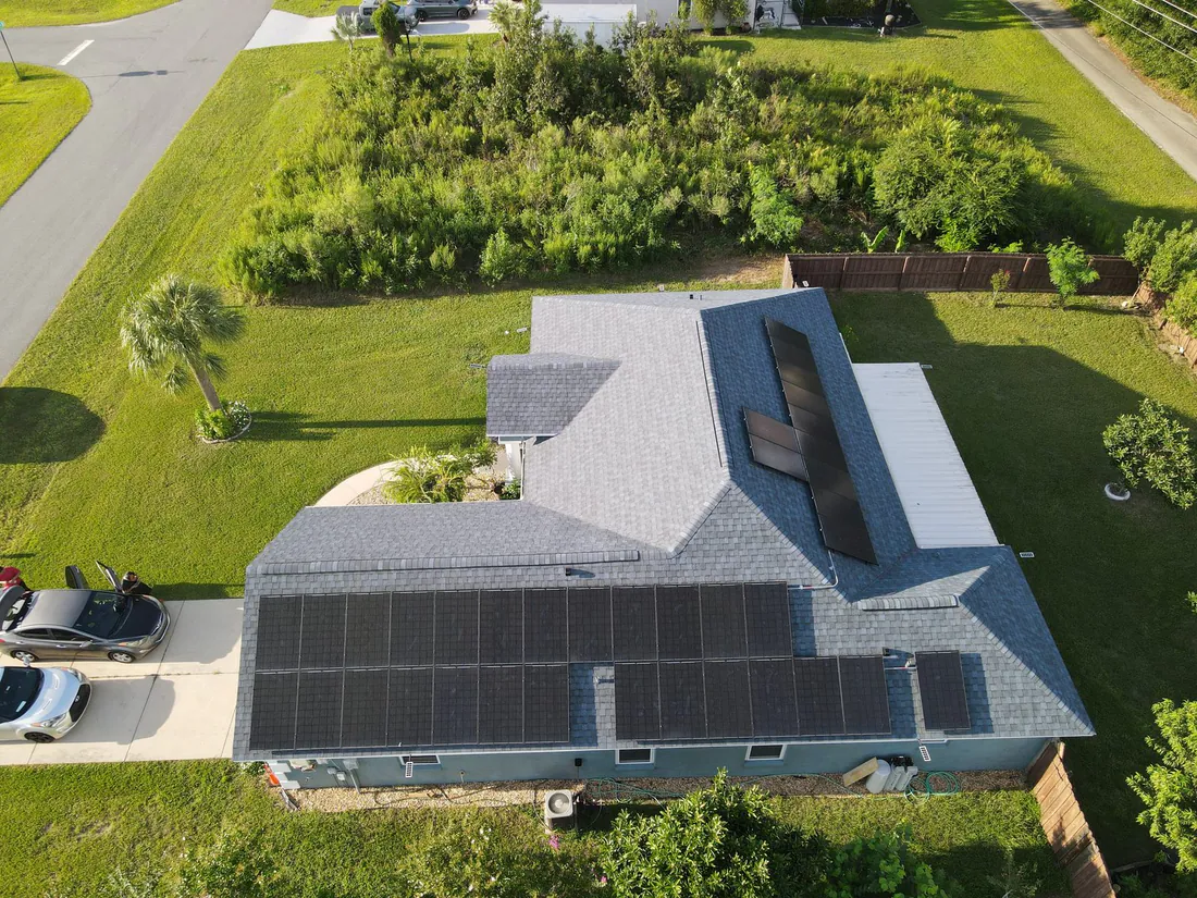 Aerial drone photo of a Central Florida home with newly installed solar panels