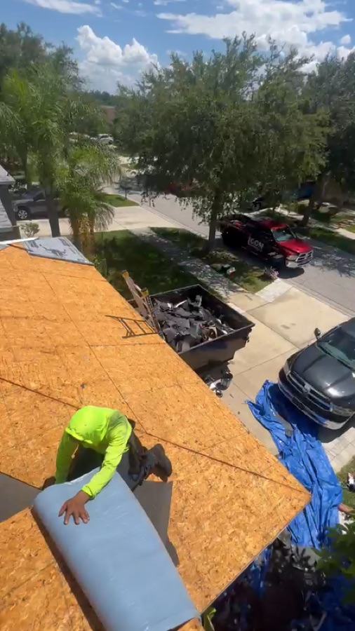 Roof deck and underlayment installation with Icon Roofing truck on site