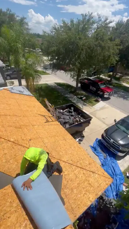 Roof deck and underlayment installation with Icon Roofing truck on site