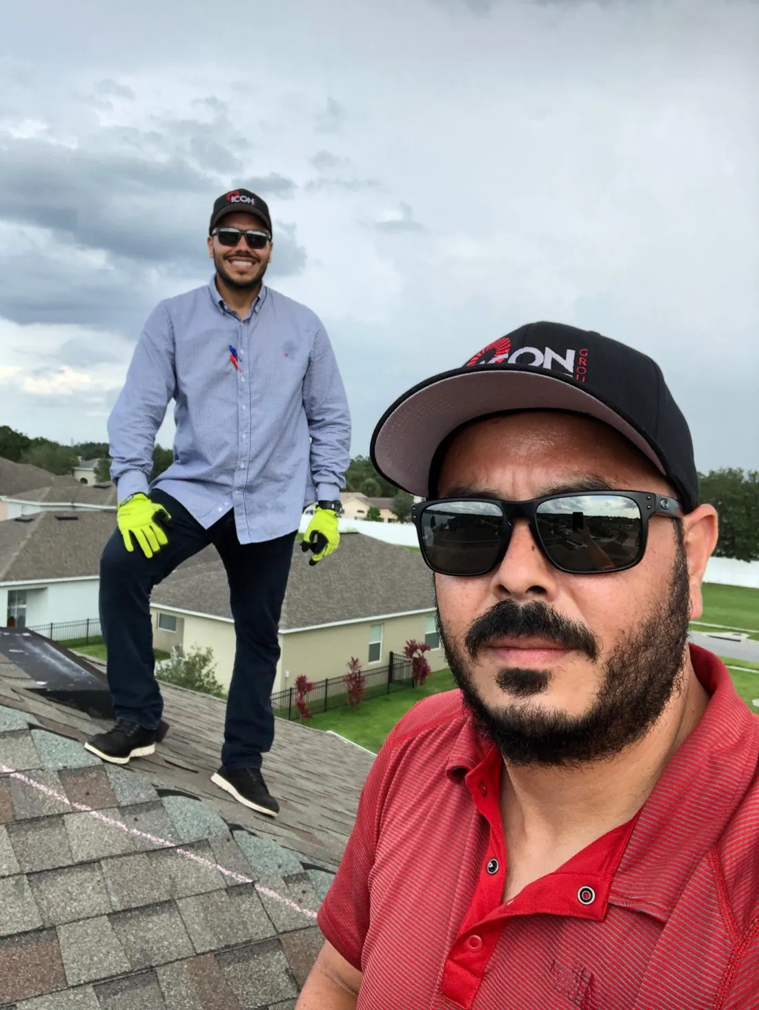 Icon Roofing Group team on a completed roof